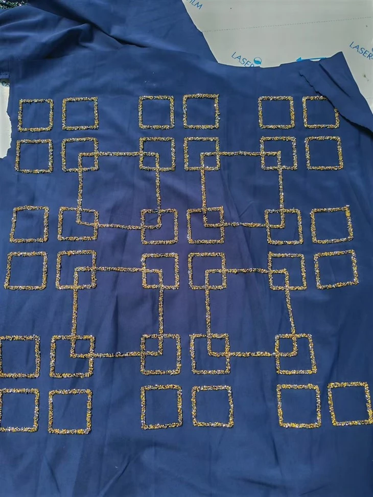 Fabric sample with rhinestones